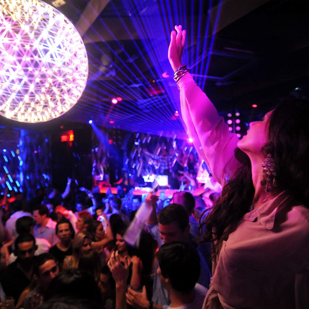 Colorful poster promoting a nightlife bar event with live music and drinks