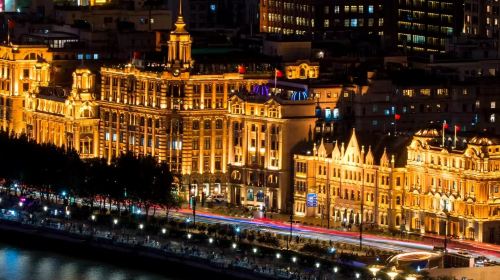 The Bund illuminated at night as seen from Huangpu River cruise