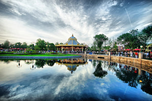 Riverside carousel at Shanghai Disneyland near the tranquil river