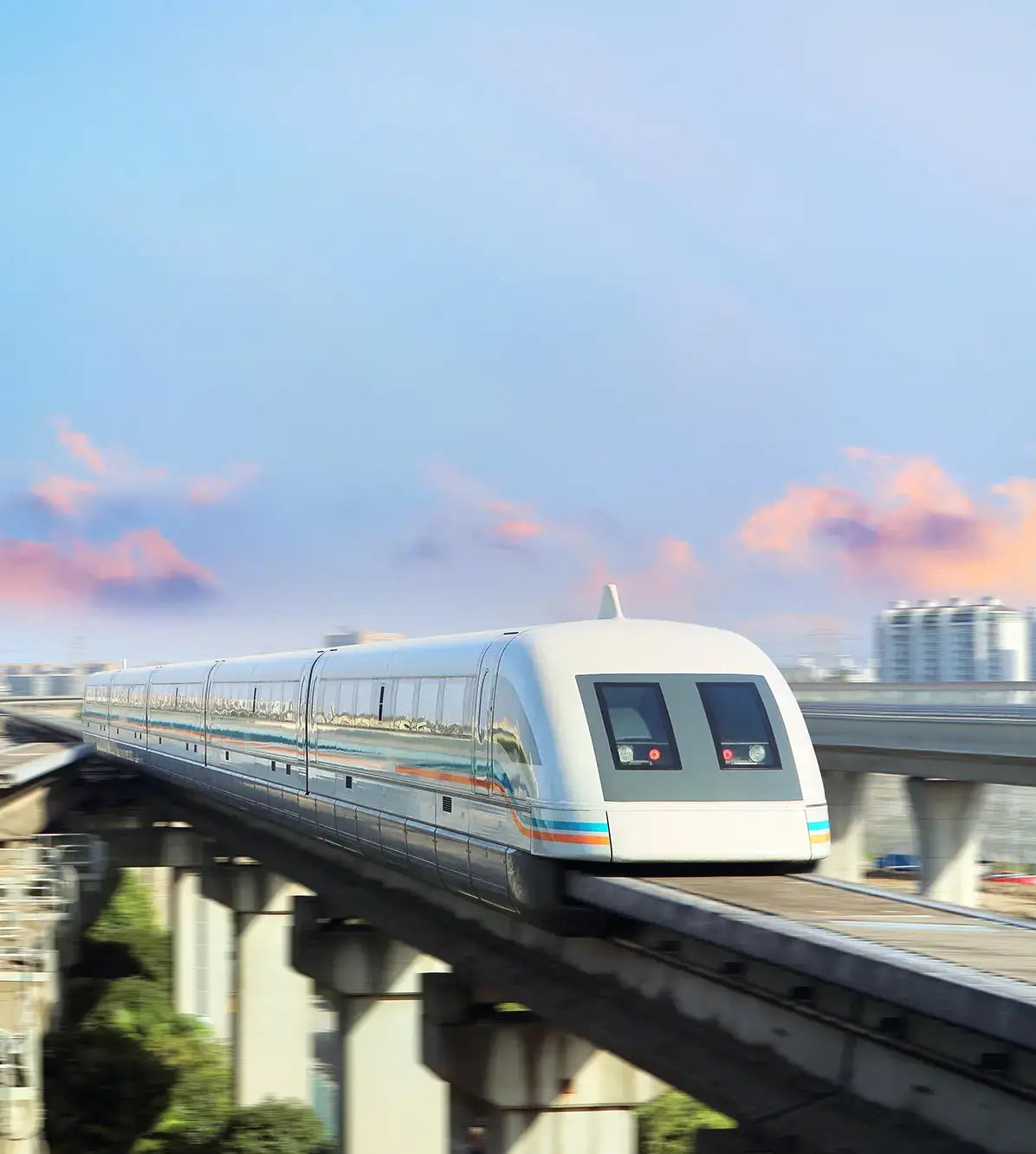 Shanghai Maglev Train speeding on elevated tracks with city skyline