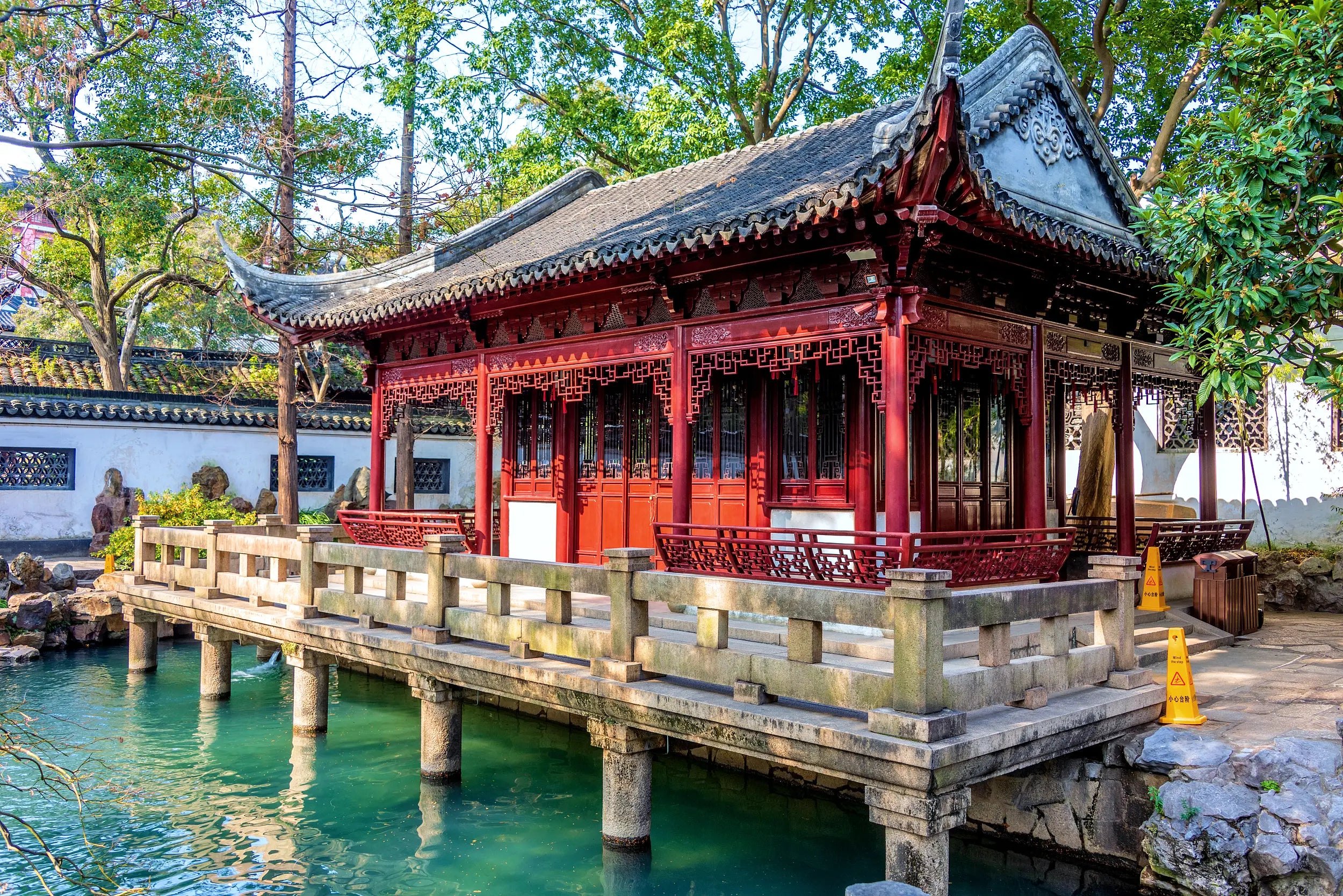 Tingtaoge Pavilion in Yuyuan Garden, a peaceful traditional Chinese waterside structure