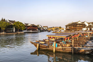Group tour exploring Zhujiajiao Ancient Town with a guide