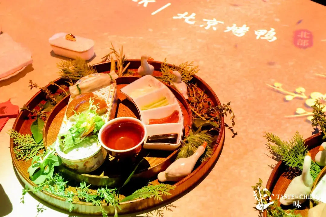 Close-up of a traditional Beijing Roast Duck dish, showcasing its crispy skin and authentic presentation at The Bund, Shanghai.