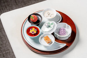 Traditional Chinese desserts elegantly presented as part of the immersive dining experience at The Bund, Shanghai.