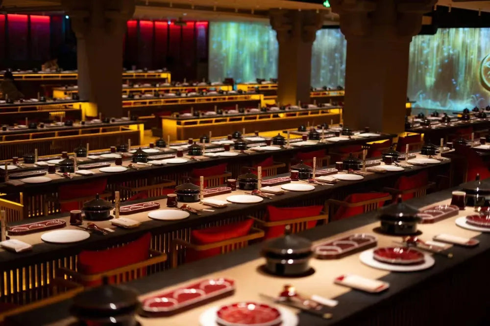 Neatly arranged tableware set for guests at the immersive Shanghai Palace Banquet, ready for the dining experience.