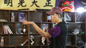 Instructor teaching footwork techniques in Wing Chun class