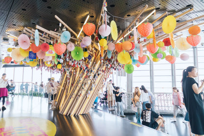 Close-up of handwritten wish cards tied to the Wishing Tree at Shanghai Tower