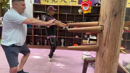 Group practicing focus, structure, and inner strength in Wing Chun