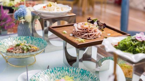 Yangpu Bridge glowing lights seen from Huangpu River cruise